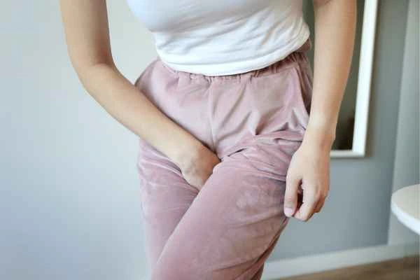 older woman running to the toilet because of urinary incontinence Accrington